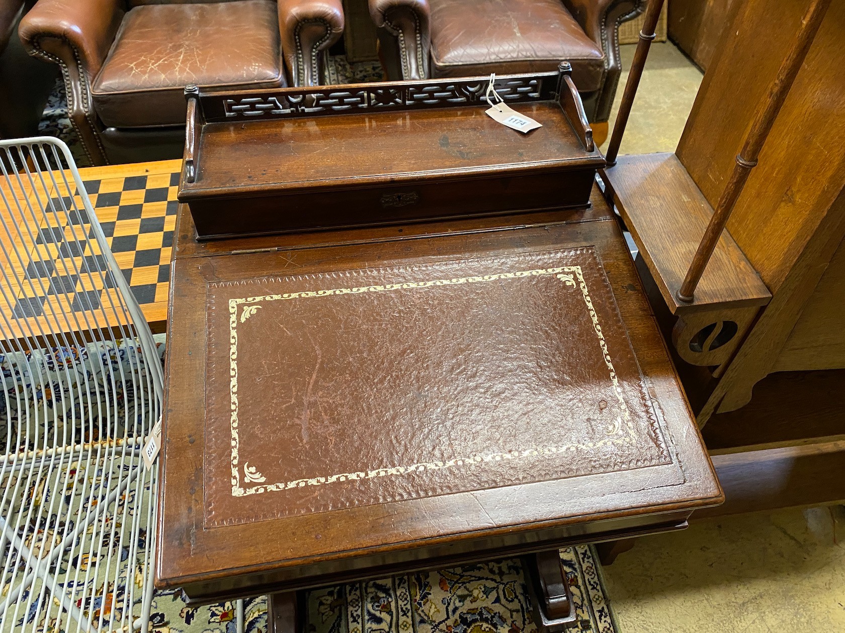 A late Victorian mahogany Davenport, width 56cm, depth 56cm, height 92cm